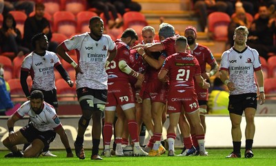 011021 - Scarlets v Emirates Lions - United Rugby Championship - Steff Evans of Scarlets celebrates scoring try with team mates