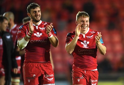 011021 - Scarlets v Emirates Lions - United Rugby Championship - Dan Jones and Sam Costelow of Scarlets celebrate win