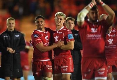 011021 - Scarlets v Emirates Lions - United Rugby Championship - Dan Davis and Tom Rogers of Scarlets celebrate win