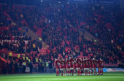 011021 - Scarlets v Emirates Lions - United Rugby Championship - Scarlets players during a minutes silence