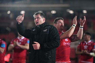 011021 - Scarlets v Emirates Lions - United Rugby Championship - Ryan Elias and Phil Price of Scarlets celebrate win