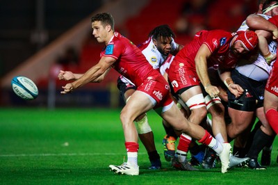 011021 - Scarlets v Emirates Lions - United Rugby Championship - Kieran Hardy of Scarlets passes the ball