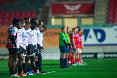 011021 - Scarlets v Emirates Lions - United Rugby Championship - Emirates Lions team observe a minute's silence