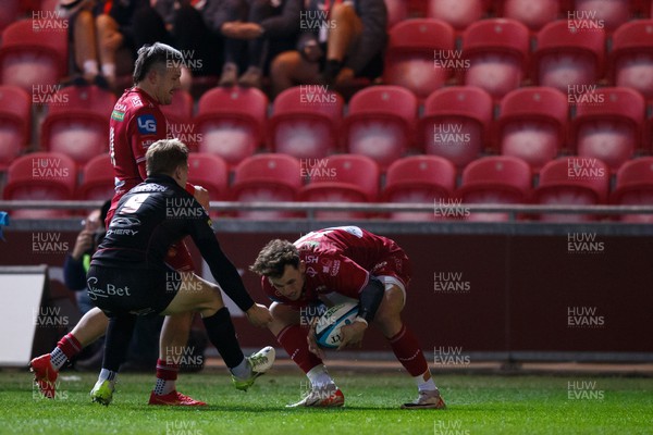 111123 - Scarlets v Emirates Lions - United Rugby Championship - Tom Rogers of Scarlets scores a try