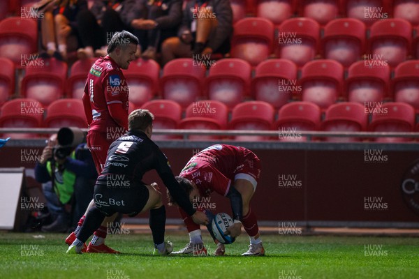 111123 - Scarlets v Emirates Lions - United Rugby Championship - Tom Rogers of Scarlets scores a try