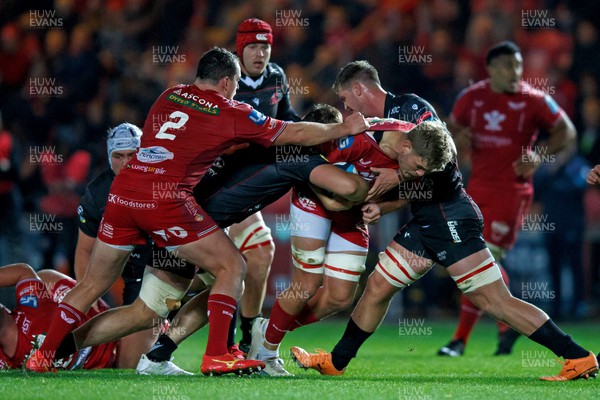 111123 - Scarlets v Emirates Lions - United Rugby Championship - Teddy Leatherbarrow of Scarlets is held