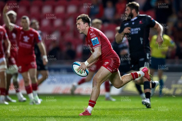 111123 - Scarlets v Emirates Lions - United Rugby Championship - Ioan Lloyd of Scarlets runs out of defence
