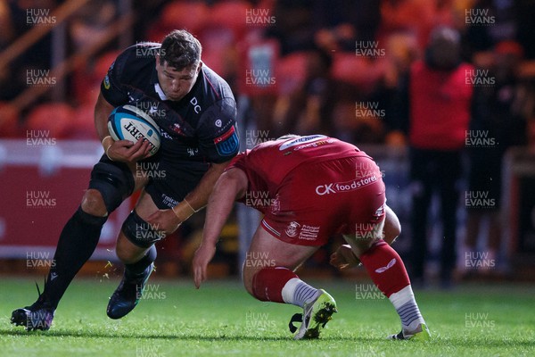 111123 - Scarlets v Emirates Lions - United Rugby Championship - Willem Alberts of Lions takes on Steff Thomas of Scarlets