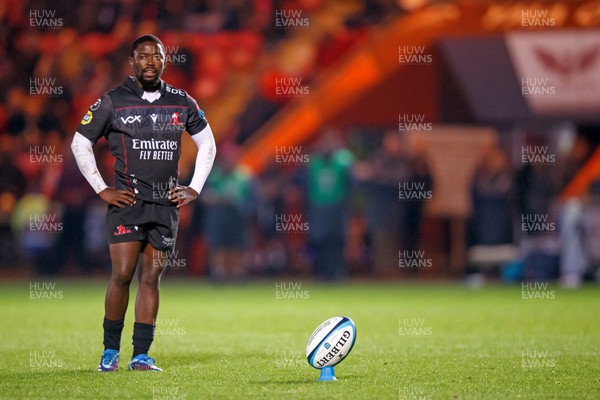 111123 - Scarlets v Emirates Lions - United Rugby Championship - Sanele Nohamba of Lions watches the clock countdown before kicking a conversion
