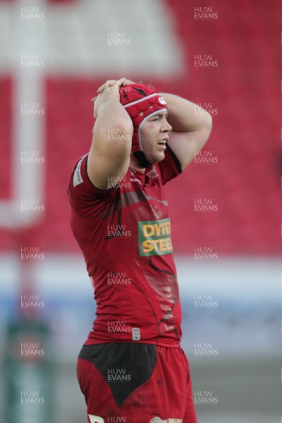 081212 Scarlets v Exeter Chiefs - Heineken Cup - Scarlets' Kieran Murphy looks dejected after the game 