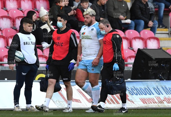 050322 - Scarlets v Glasgow - United Rugby Championship - Oli Kebble of Glasgow leaves the field with medical staff