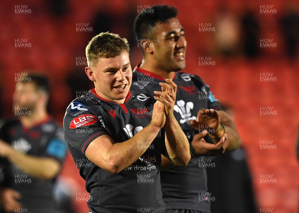 050322 - Scarlets v Glasgow - United Rugby Championship - Sam Costelow and Carwyn Tuipulotu of Scarlets at the end of the game