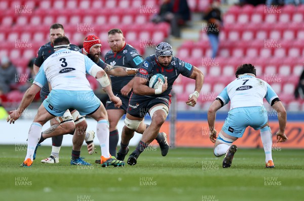 050322 - Scarlets v Glasgow - United Rugby Championship - Sione Kalamafoni of Scarlets is challenged by Ally Miller of Glasgow