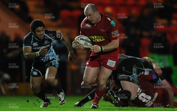 07.01.12 - Scarlets v Glasgow - RaboDirect PRO12 - Iestyn Thomas of Scarlets takes on David Lemi of Glasgow. 