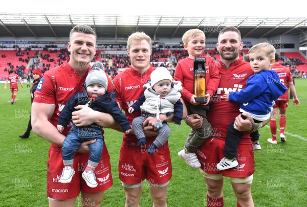 070418 - Scarlets v Glasgow - Guinness PRO14 - Scott Williams with son Seb, Aled Davies with son Freddie and John Barclay with sons Finn and Logan