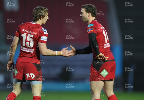 120413 - Scarlets v Glasgow Warriors - RaboDirect PRO12 -George North of Scarlets congratulates Liam Williams after try 