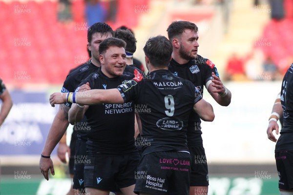 290423 - Scarlets v Glasgow Warriors - EPCR Challenge Cup Semi-Final - Duncan Weir and George Horne (9) of Glasgow Warriors celebrate reaching the final at the end of the game