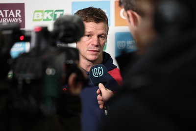 291125 - Scarlets v Glasgow Warriors - United Rugby Championship - Scarlets Head Coach Dwayne Peel talks to TV before kick off