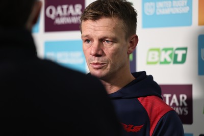 291125 - Scarlets v Glasgow Warriors - United Rugby Championship - Scarlets Head Coach Dwayne Peel talks to TV before kick off