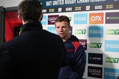 291125 - Scarlets v Glasgow Warriors - United Rugby Championship - Scarlets Head Coach Dwayne Peel talks to TV before kick off