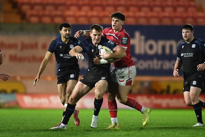 291125 - Scarlets v Glasgow Warriors - United Rugby Championship - Stafford McDowall of Glasgow is challenged by Eddie James of Scarlets