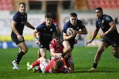 291125 - Scarlets v Glasgow Warriors - United Rugby Championship - Dan Lancaster of Glasgow is challenged by Sam Costelow of Scarlets