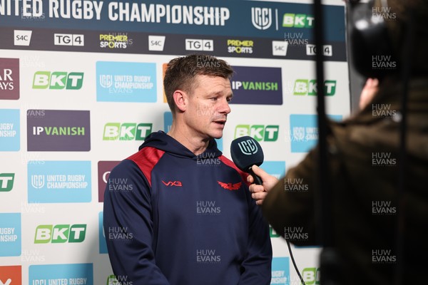 291125 - Scarlets v Glasgow Warriors - United Rugby Championship - Scarlets Head Coach Dwayne Peel talks to TV before kick off