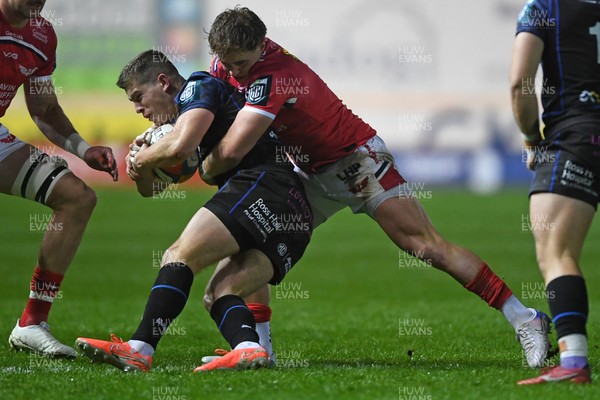 291125 - Scarlets v Glasgow Warriors - United Rugby Championship - Macs Page of Scarlets is challenged by Dan Lancaster of Glasgow
