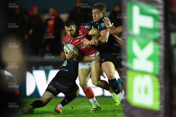 291125 - Scarlets v Glasgow Warriors - United Rugby Championship - Gareth Davies of Scarlets is challenged by Alex Craig of Glasgow