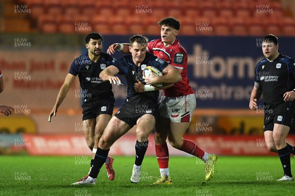 291125 - Scarlets v Glasgow Warriors - United Rugby Championship - Stafford McDowall of Glasgow is challenged by Eddie James of Scarlets