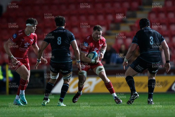 300324 - Scarlets v Glasgow Warriors - United Rugby Championship - Alex Craig of Scarlets takes on Henco Venter and Zander Fagerson of Glasgow