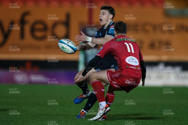 300324 - Scarlets v Glasgow Warriors - United Rugby Championship - Tom Jordan of Glasgow passes the ball
