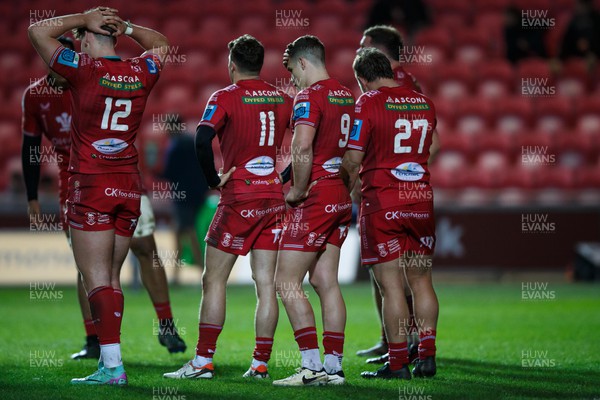 300324 - Scarlets v Glasgow Warriors - United Rugby Championship - Scarlets players looking dejected