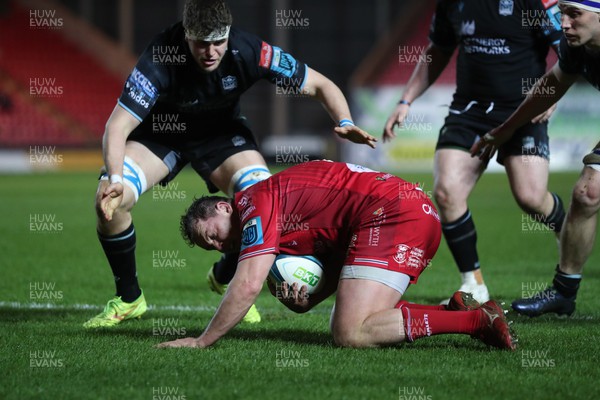300324 - Scarlets v Glasgow Warriors - United Rugby Championship - Ryan Elias of Scarlets under pressure behind his own try line