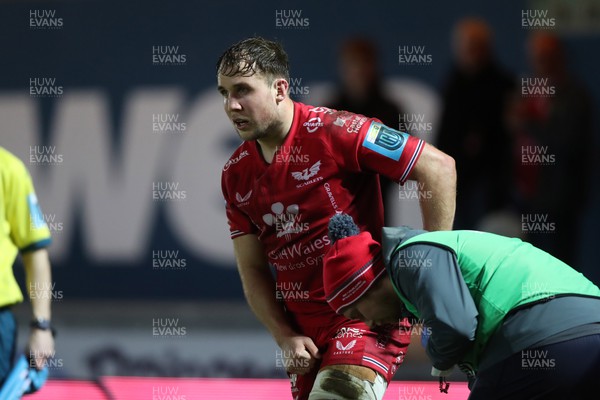 300324 - Scarlets v Glasgow Warriors - United Rugby Championship - Ioan Lloyd of Scarlets receives attention for an injury
