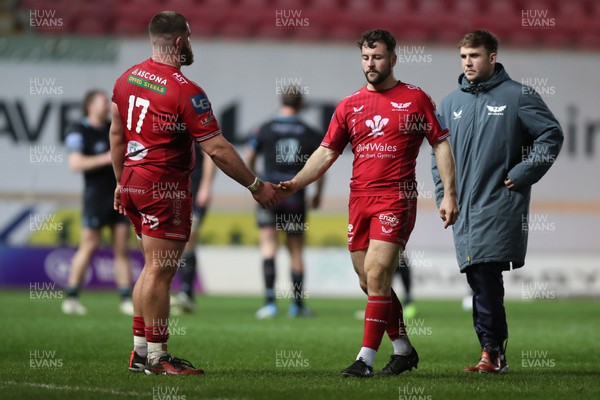 300324 - Scarlets v Glasgow Warriors - United Rugby Championship - Kemsley Mathias and Ryan Conbeer of Scarlets at the final whistle