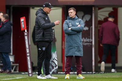 260424 - Scarlets v Hollywoodbets Sharks - United Rugby Championship - Sharks head coach John Plumtree and Scarlets head coach Dwayne Peel before the match