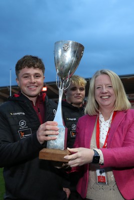 260424 - Scarlets v Hollywoodbets Sharks - United Rugby Championship - WRU CEO Abi Tierney presents the Premiership Cup to players and coaches from Llandovery RFC