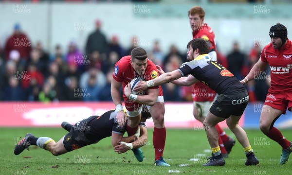 300318 - Scarlets v La Rochelle - European Rugby Champions Cup - Scott Williams of Scarlets is tackled by Steve Barry of La Rochelle