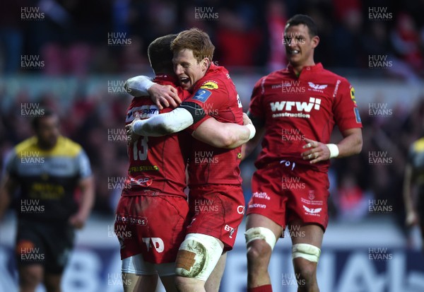 300318 - Scarlets v La Rochelle - European Rugby Champions Cup - Scott Williams of Scarlets celebrates his try with Rhys Patchell