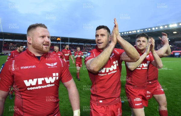 300318 - Scarlets v La Rochelle - European Rugby Champions Cup - Samson Lee, Gareth Davies and Steff Evans of Scarlets celebrate