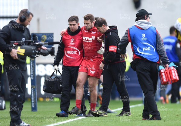 300318 - Scarlets v La Rochelle - European Rugby Champions Cup - Paul Asquith of Scarlets leaves the field with an injury