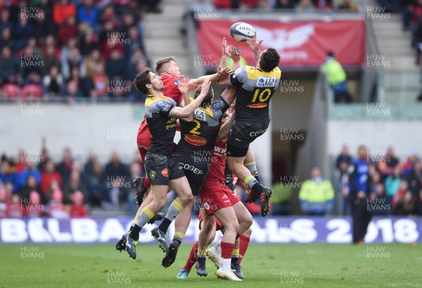 300318 - Scarlets v La Rochelle - European Rugby Champions Cup - Jeremy Sinzelle of La Rochelle and James Davies of Scarlets jump for high ball