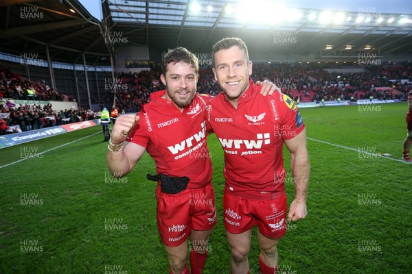 300318 - Scarlets v La Rochelle - European Champions Cup Quarter Final - Leigh Halfpenny and Gareth Davies of Scarlets