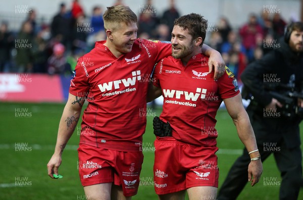 300318 - Scarlets v La Rochelle - European Champions Cup Quarter Final - James Davies and Leigh Halfpenny of Scarlets