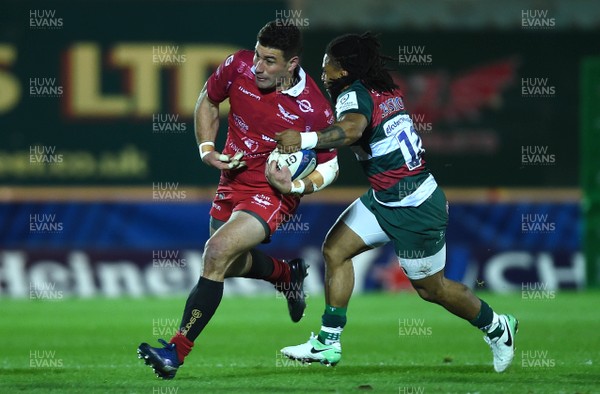 120119 - Scarlets v Leicester Tigers - European Rugby Heineken Champions Cup - Kieron Fonotia of Scarlets is tackled by Kyle Eastmond of Leicester Tigers