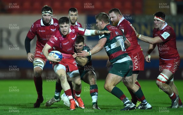 120119 - Scarlets v Leicester Tigers - European Rugby Heineken Champions Cup - Steff Evans of Scarlets is tackled by Ben White of Leicester Tigers