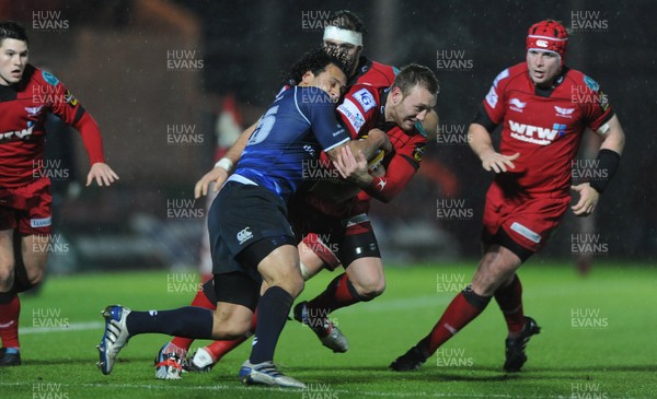 03.12.10 - Scarlets v Leinster - Magners League - Morgan Stoddart of Scarlets is tackled by Isikeli Nacewa of Leinster. 