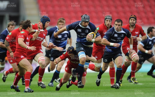 05.09.09 - Llanelli Scarlets v Leinster - Magners League - Kevin McLaughlin of Leinster is tackled by Richie Pugh. 