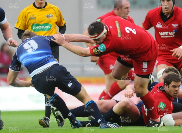 05.09.09 - Scarlets v Leinster Scarlets Ken Owens brushes off a tackle from Leinster's Chris Keane 